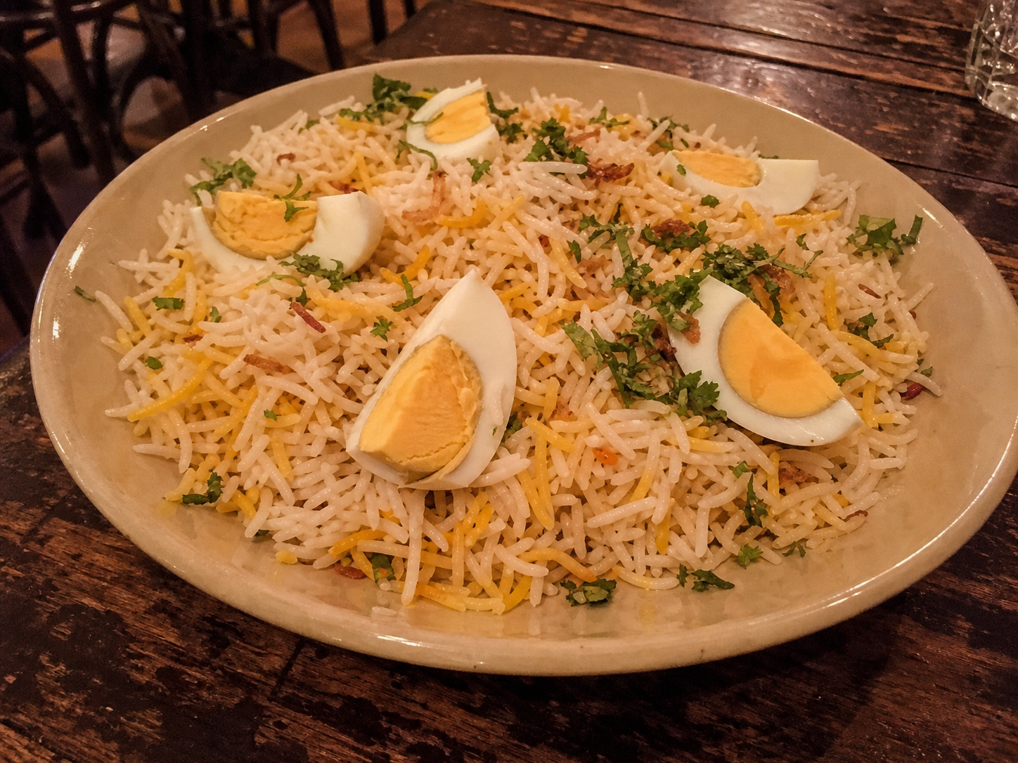 Anda pulao basmati rice with saffron and boiled egg