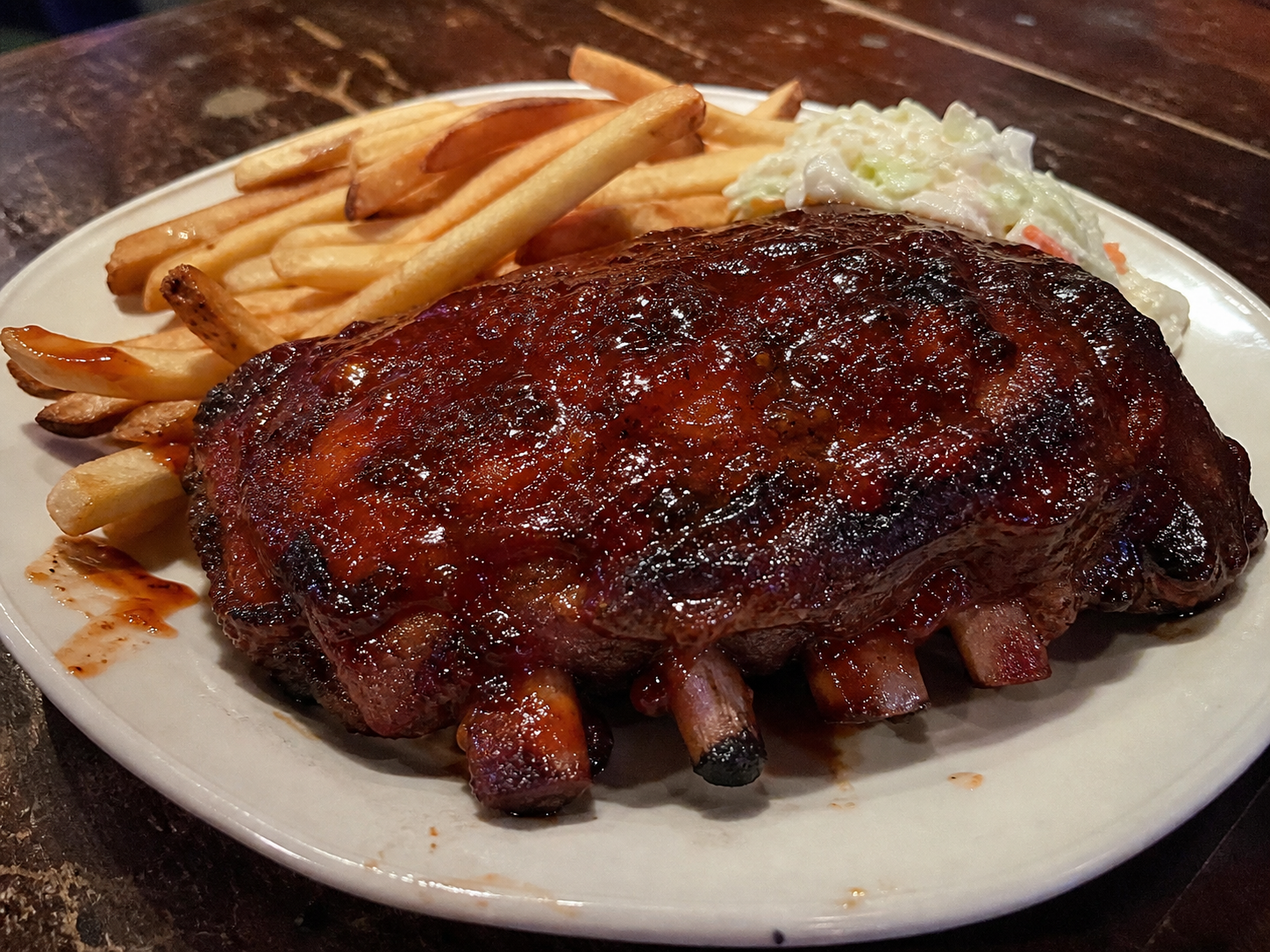 BBQ pork ribs with fries and slaw