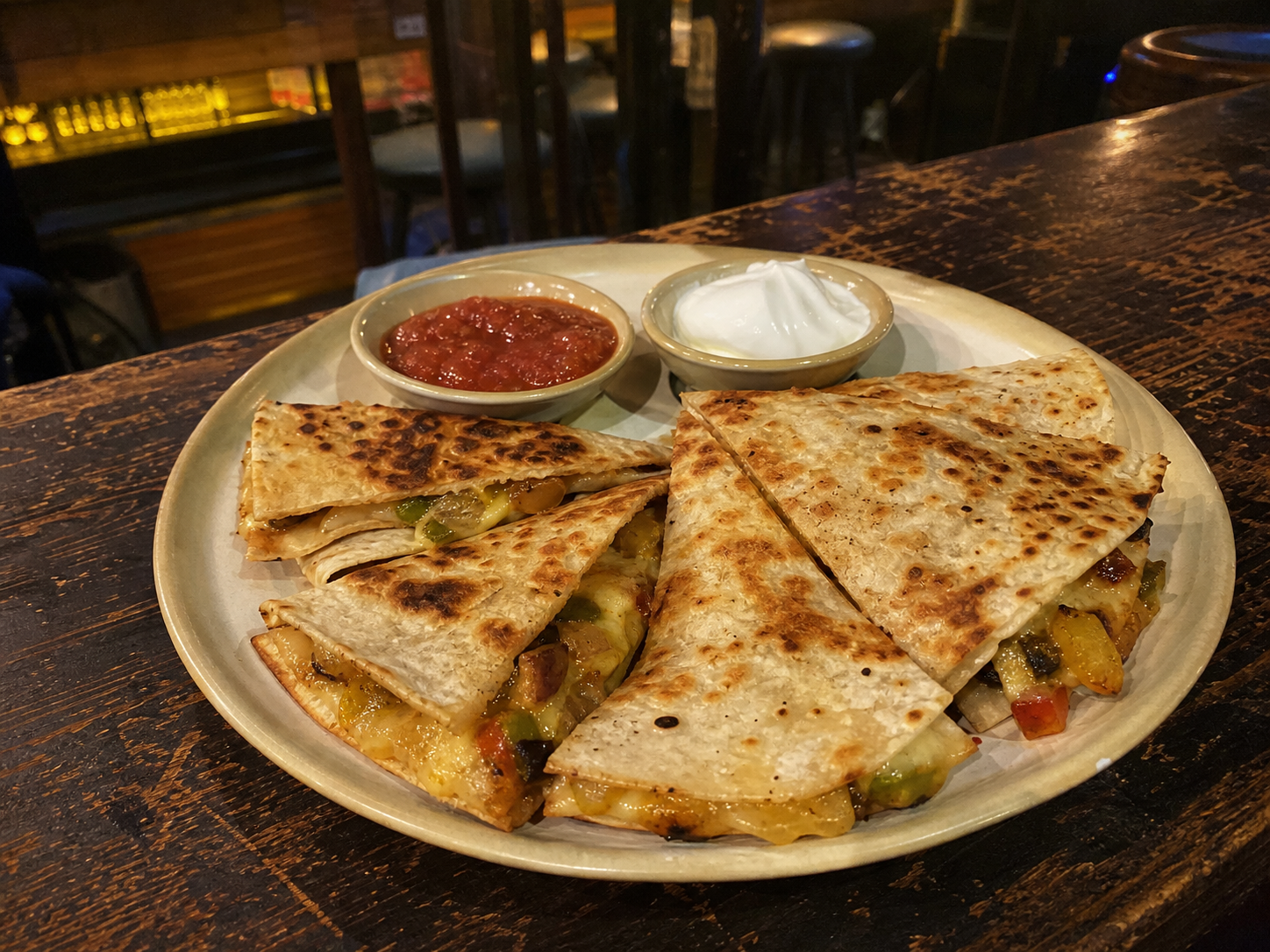 Buddha quesadillas with salsa and sour cream