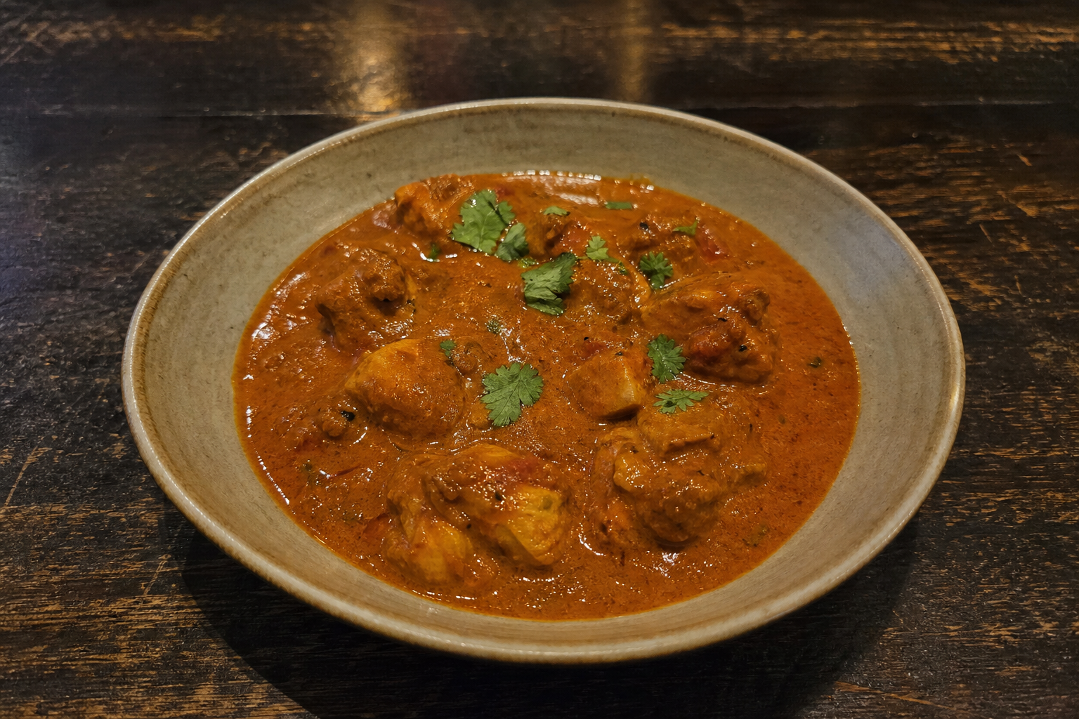 Chicken Madras in a deep red coconut curry sauce