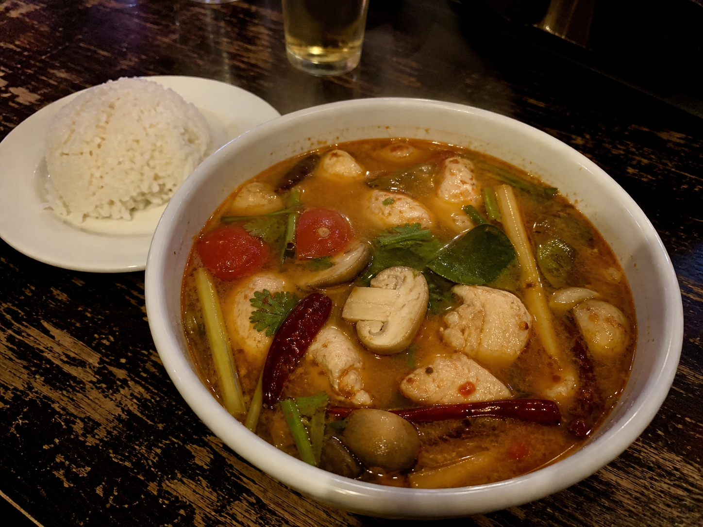 Chicken Tom Yum soup with mushrooms, herbs and chilli