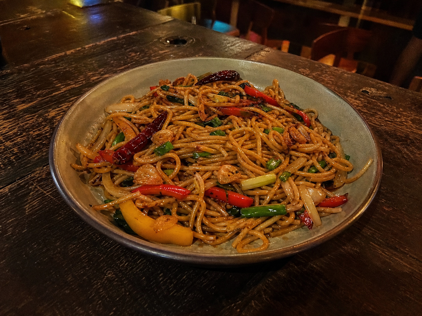 Chilli garlic noodles with peppers, onion and dried chilli
