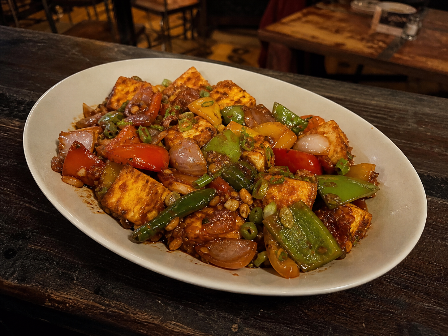 Chilli paneer with bell pepper, onion and green chilli