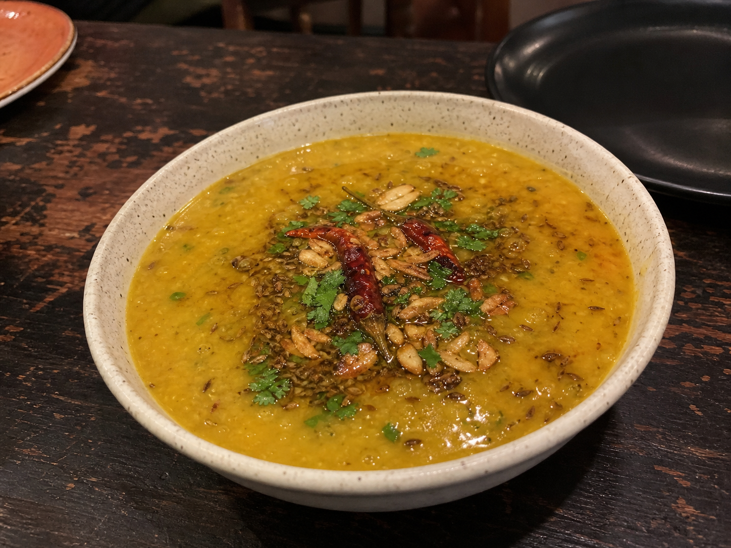 Daal tarka with yellow lentils, garlic and dried chilli