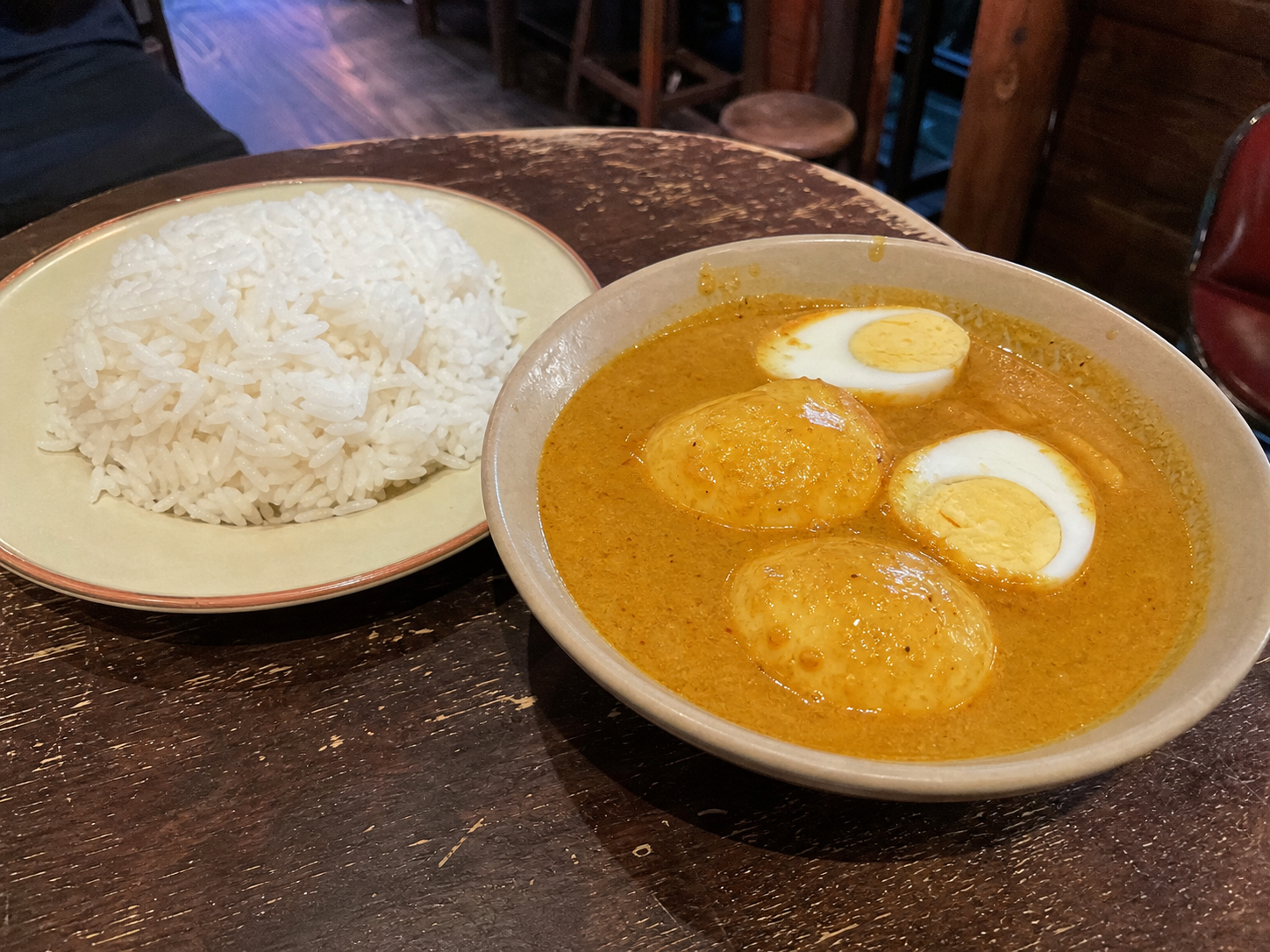 Egg curry served with basmati rice