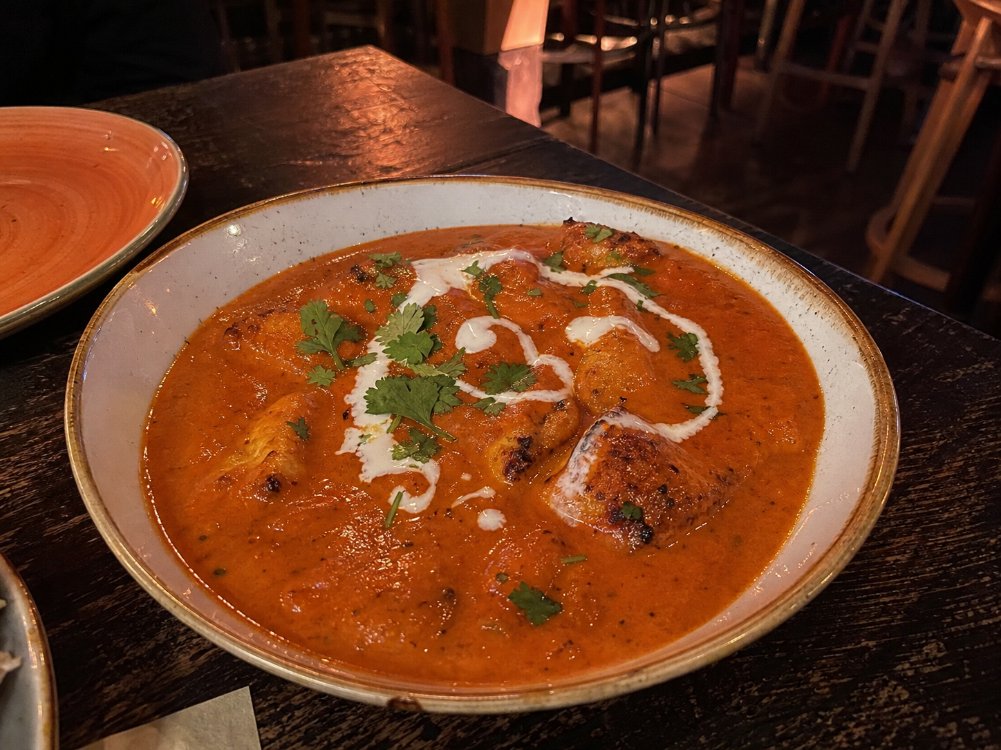 Fish tikka masala with cream and coriander