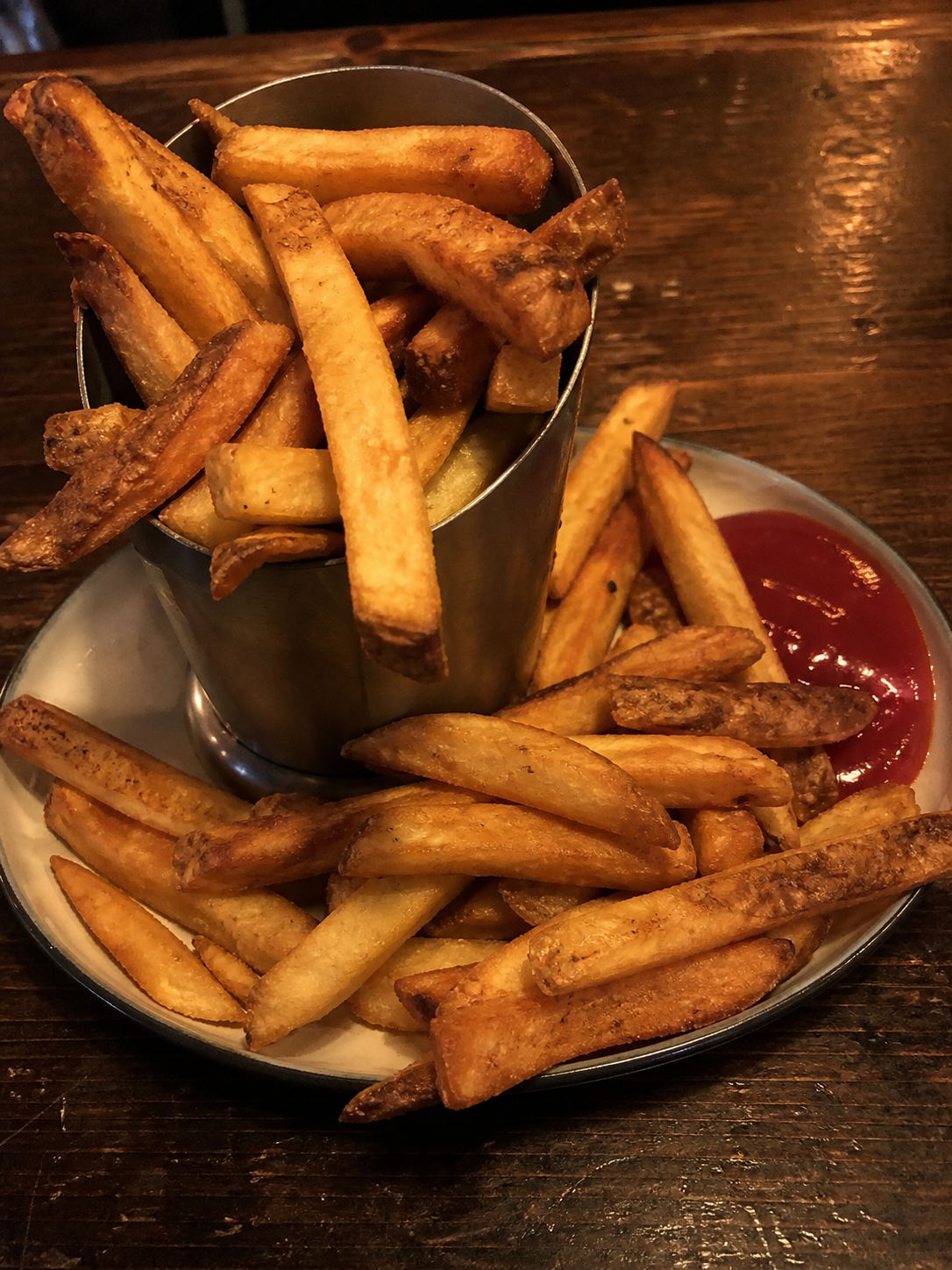 Thick-cut French fries with ketchup