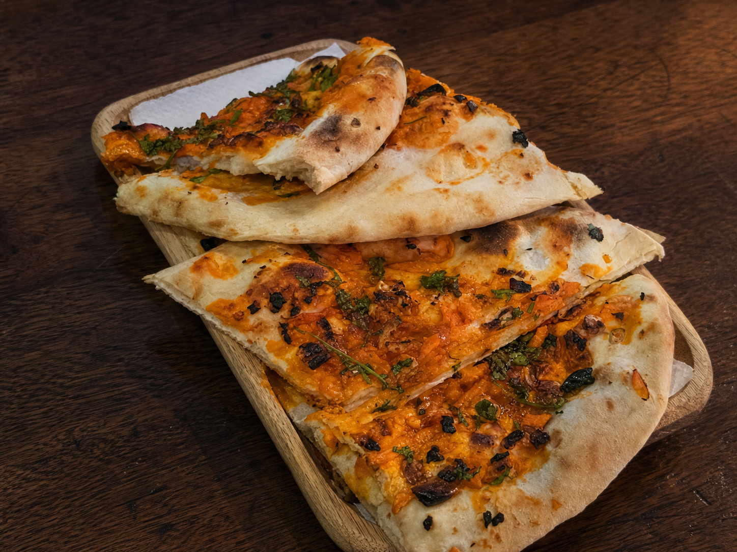 Ghee-brushed Kashmiri naan stuffed with dried fruit, nuts and coconut
