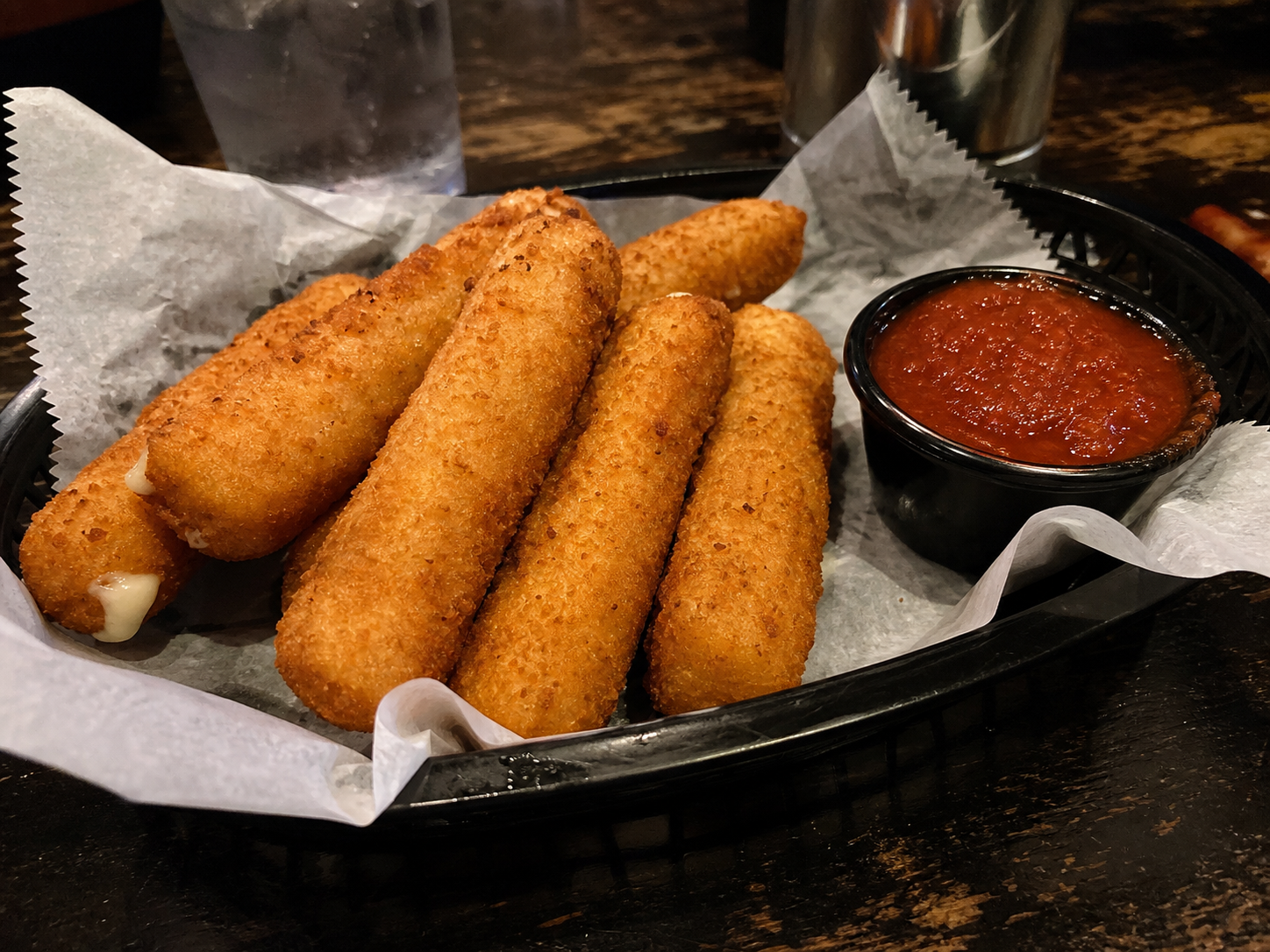 Crispy mozzarella sticks with marinara sauce