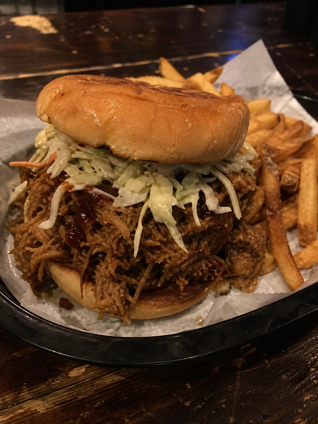 Pulled pork burger with Asian slaw and fries