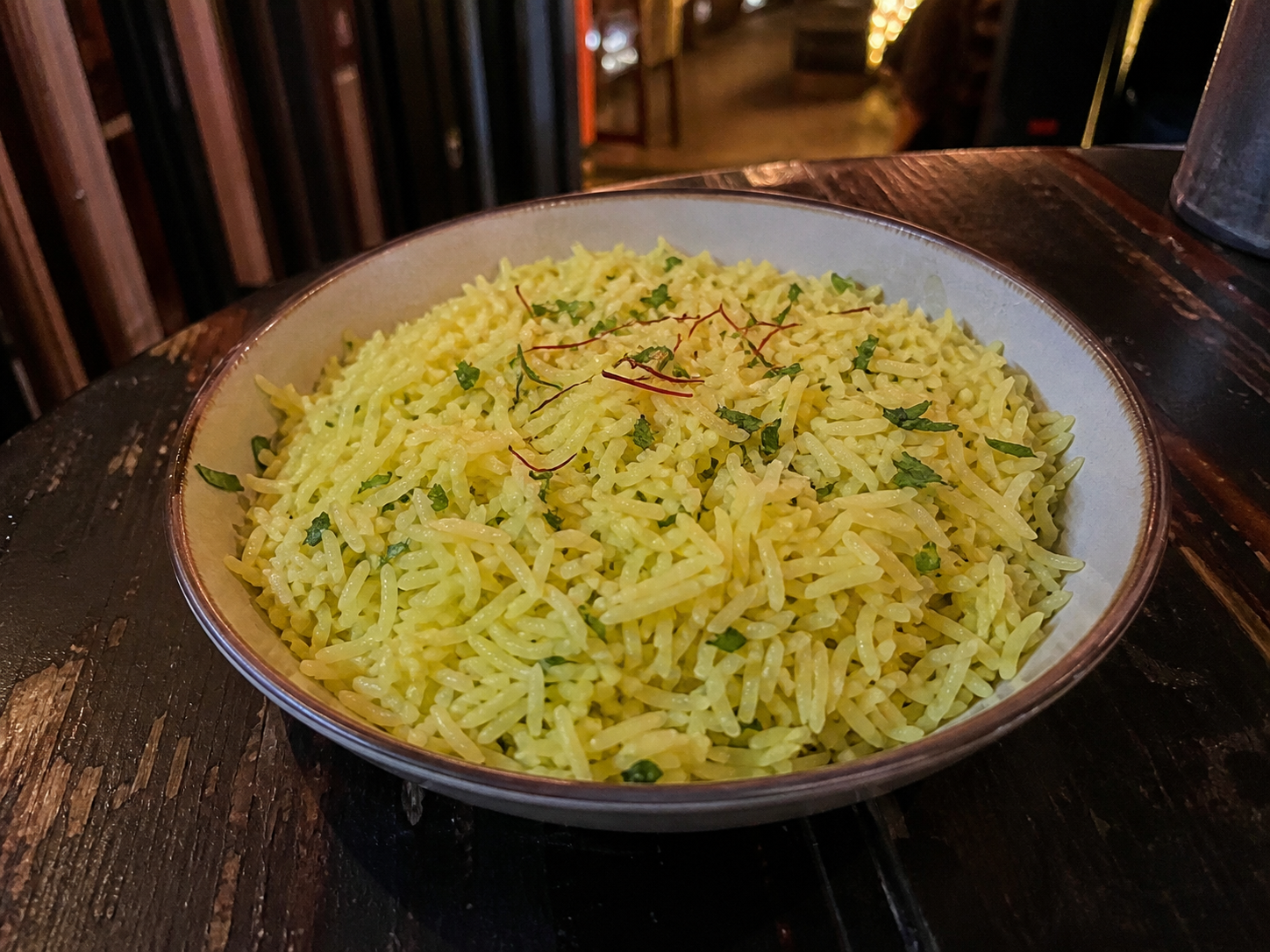Saffron basmati rice with fresh herbs and saffron strands