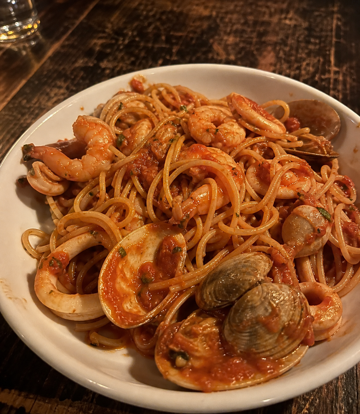 Seafood spaghetti with shrimp, squid, clams and tomato sauce